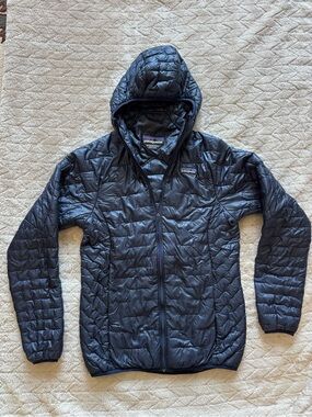 Patagonia Women's Hooded Puff Jacket in Navy Blue